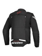 Kurtka Alpinestars T-Stunt Air, widok z tyłu, czarno-biała, czerwone logo gwiazdy na karku, białe logo na dole pleców, pionowe zamki modułowego systemu przepływu powietrza