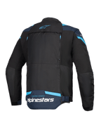 Alpinestars T-Stunt Air Jacket, kurtka motocyklowa, czarna, ciemnoniebieska i jasnoniebieska, widok z tyłu przedstawiający duży modułowy panel z zamkami błyskawicznymi, branding Alpinestars i napis „Racing Ahead” na dole pleców.