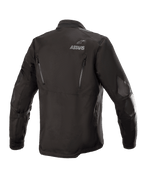 Alpinestars Venture XT Jacket, czarna, widok z tyłu tekstylnej kurtki motocyklowej adventure touring, logo ASTARS na ramieniu, pionowe zamki wentylacyjne na plecach, wzmocnienia z folii PU na rękawach