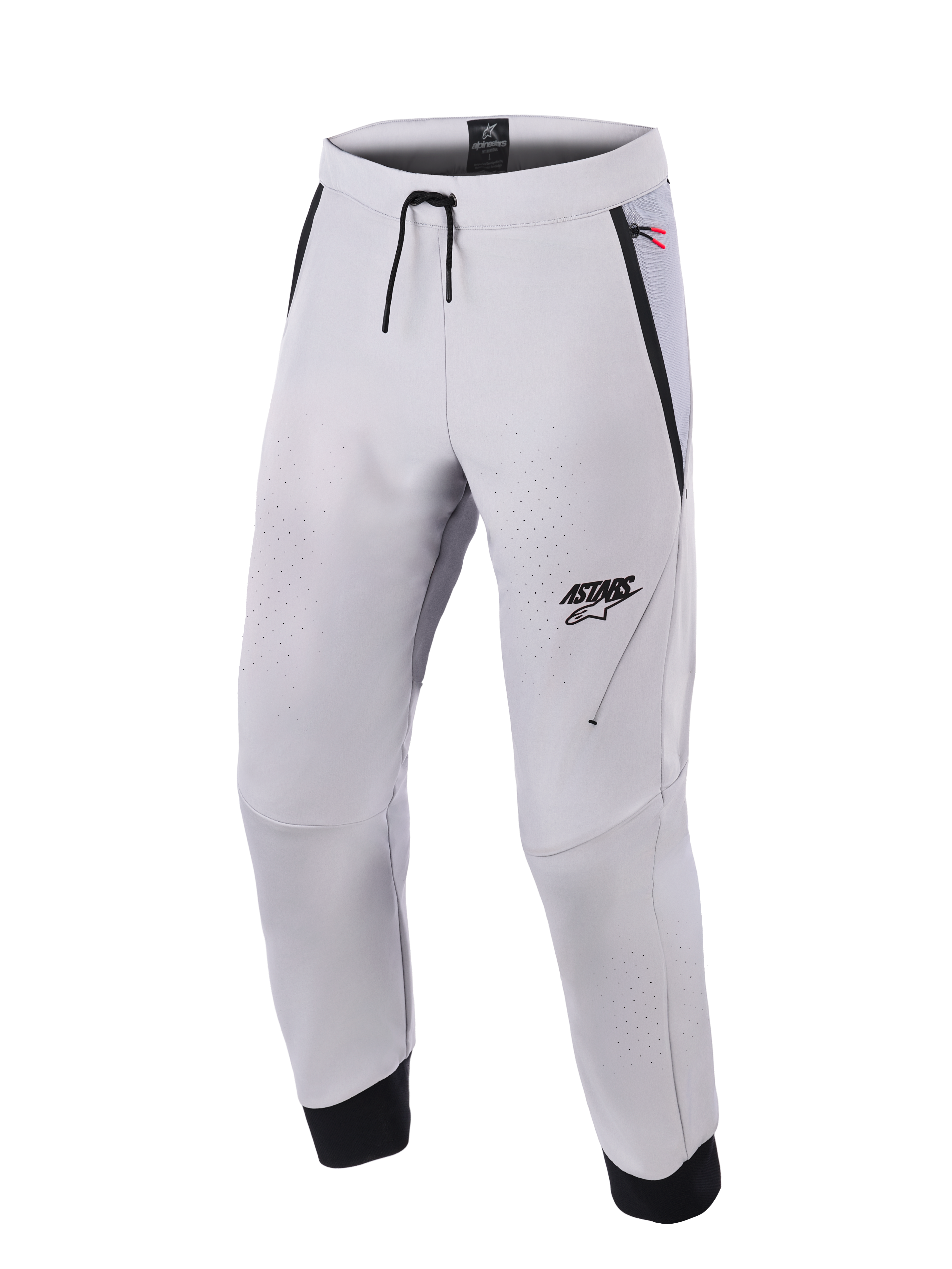 Alpinestars Aeroshell Airflow Pants, spodnie motocyklowe w kolorze Mid Gray, wyposażone w laserowo perforowane strefy wentylacyjne, logo ASTARS na lewym udzie, ściągacz w pasie i czarne mankiety na kostkach, techniczna konstrukcja softshell do jazdy sportowej i miejskiej