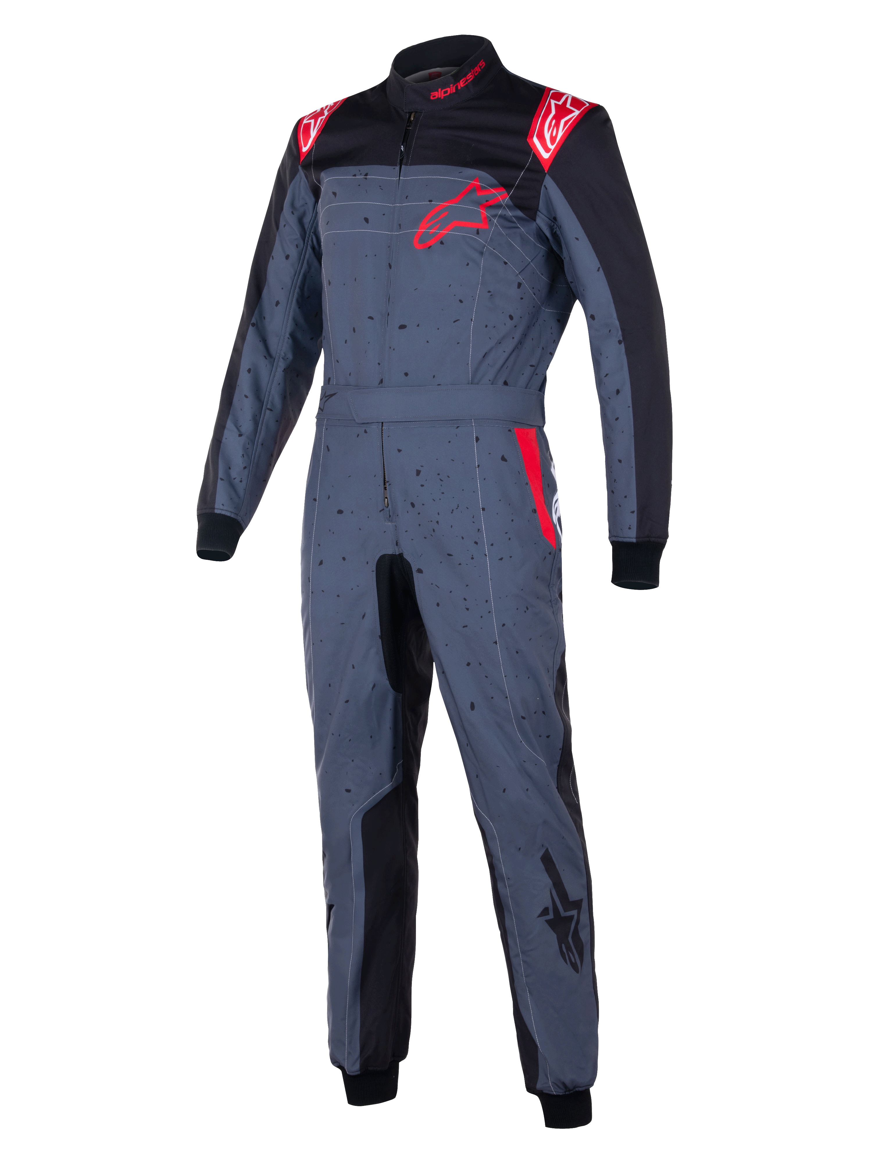 Kombinezon Alpinestars KMX-9 V3 Graphic 6, kombinezon kartingowy, szary antracytowy z czarnymi i czerwonymi akcentami, nakrapiany wzór graficzny, czerwone logo gwiazdy na piersi, czarne panele wewnętrzne i czerwone detale na ramionach, profesjonalna odzież wyścigowa do sportów motorowych