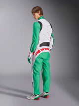 Alpinestars KMX-9 V3 Graphic 6 Suit, Karting Suit, White Green and Red, model viewed from the back-side, featuring green sleeves and lower panels, white upper torso with black speckle detail, bold red Alpinestars branding across the lower back, paired with matching white and green karting shoes.