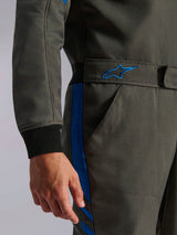 Alpinestars GP Race V3 Suit FIA, Anthracite Blue auto racing suit, close-up detail of the waist area featuring an adjustable belt with embroidered logo, side pocket, and black ribbed sleeve cuff.