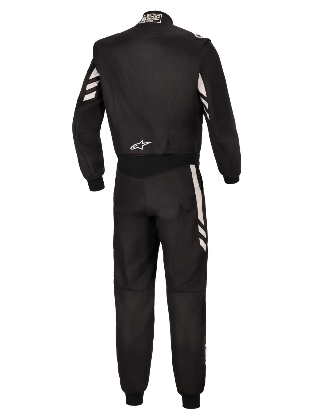 Alpinestars GP Race V3 Suit FIA, widok z tyłu czarnego jednoczęściowego kombinezonu samochodowego ze srebrnymi akcentami na rękawach i nogawkach, białe logo Alpinestars na dolnej części pleców, profesjonalny sprzęt do sportów motorowych z certyfikatem FIA.