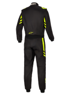 Alpinestars GP Race V3 Suit FIA, kombinezon samochodowy, czarno-żółty fluo, widok z tyłu pokazujący fluorescencyjne żółte akcenty na ramionach i nogawkach, małe żółte logo w dolnej części pleców i metka z certyfikatem FIA na kołnierzu.