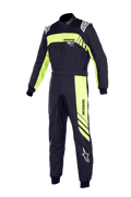 Alpinestars Youth KMX-9 V3 Suit Graphic 3, kombinezon kartingowy, czarny i żółty fluo, jednoczęściowa konstrukcja z wysokim kołnierzem, pasem w talii i ściągaczami na mankietach, z wyraźnym brandingiem „ASTARS” i grafiką w ukośne pasy