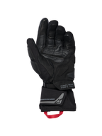 Rękawice Alpinestars WT-8 GORE-TEX Insulated, rękawice motocyklowe, czarne, widok wewnętrznej strony dłoni pokazujący wzmocnione skórzane panele i wyściełane ślizgacze, długi mankiet z czerwoną pętlą i brandingiem Alpinestars Exploration Equipment ze współrzędnymi geograficznymi, techniczny design szosowy i adventure