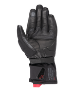 Alpinestars WT-4 GORE-TEX Insulated Glove, rękawica motocyklowa, czarna, widok od strony dłoni o skórzanej konstrukcji z gumową wstawką poprawiającą chwyt, mankiet średniej długości z brandingiem Alpinestars Exploration Equipment i czerwonymi akcentami logo