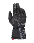 Alpinestars WT-4 Gore-Tex Insulated Glove, czarna rękawica motocyklowa, twardy ochraniacz kostek, konstrukcja skórzano-tekstylna, wodoodporna technologia GORE-TEX, srebrne logo i napis Alpinestars na mankiecie, czerwony akcent przy nadgarstku, zimowa rękawica motocyklowa