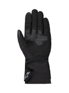 Alpinestars Wt-1 Drystar® Insulated Gloves, rękawice motocyklowe, czarne, widok od strony dłoni z wzmocnionymi tekstylnymi strefami chwytu, długi mankiet z białym logo Alpinestars na pasku, odporna na warunki atmosferyczne konstrukcja do jazdy szosowej