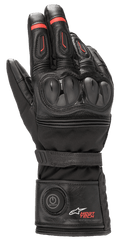 Alpinestars HT-7 Heat Tech Drystar Gloves, podgrzewane rękawice motocyklowe, czarne z czerwonymi akcentami, elektroniczny system Heat Tech z przyciskiem zasilania na mankiecie, ochrona kostek TPU, wodoodporna technologia Drystar, konstrukcja skórzano-tekstylna