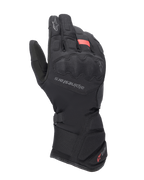 Rękawice Alpinestars Tourer W-7 V2 Drystar, zimowe motocyklowe rękawice turystyczne, czarne z czerwonymi akcentami, wzmocniona ochrona kostek, logo Alpinestars na grzbiecie dłoni oraz długi regulowany mankiet z brandingiem Drystar