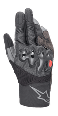 Alpinestars AMT-10 Air HDry Gloves, Motorcycle Gloves, Black and Dark Gray, featuring a wavy over-injected knuckle guard with a small red logo, mesh MATRYX and RIDEKNIT panels for ventilation, and a large gray star logo on the cuff