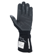Rękawice Alpinestars Tech-1 ZX V4, profesjonalne rękawice wyścigowe, kolor Black Anthracite, widok dłoni z teksturowanym silikonowym nadrukiem 3D, długi mankiet z etykietami certyfikacji FIA i SFI