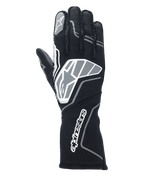 Rękawice Alpinestars Tech-1 ZX V4, rękawice wyścigowe, czarne i antracytowe, z dużym logo gwiazdy na wierzchu dłoni i napisem Alpinestars na długim mankiecie, logo gwiazdy na palcu wskazującym, profesjonalna konstrukcja ognioodporna