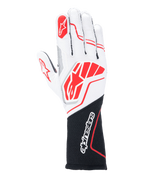 Rękawice Alpinestars Tech-1 ZX V4, rękawice wyścigowe, białe i czarne z czerwonymi akcentami, teksturowana tkanina o strukturze plastra miodu z zewnętrznymi szwami, duże czerwone logo na wierzchu dłoni, czarna przedłużona sekcja nadgarstka z białym napisem Alpinestars