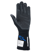 Rękawice Alpinestars Tech-1 ZX V4, samochodowe rękawice wyścigowe, czarno-niebieskie, widok od strony dłoni z szarą silikonową technologią chwytu 3D, z certyfikatami FIA i SFI na mankiecie, profesjonalna ochrona w sportach motorowych