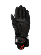 Skórzane rękawice Alpinestars GP Plus R V3, czarne, widok od strony dłoni pokazujący trwałą skórzaną konstrukcję, czerwone logo Astars na pasku nadgarstka i mankiecie, wzmocnione panele chwytne, regulowane zapięcie do jazdy wyścigowej i sportowej.