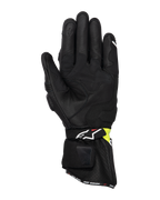Rękawice Alpinestars SP-3, motocyklowe rękawice szosowe, czarne i żółte fluo, widok od wewnętrznej strony dłoni prezentujący konstrukcję z koziej skóry, wyściełane wzmocnienia dłoni, długi mankiet z regulowanym paskiem oraz palec wskazujący kompatybilny z ekranami dotykowymi