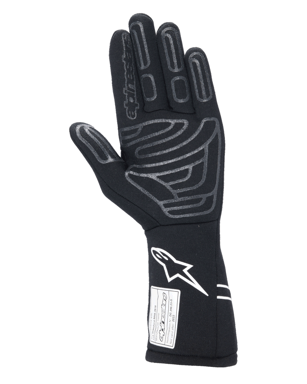 Alpinestars Tech-1 Start V4 Gloves FIA, czarne samochodowe rękawice wyścigowe, widok od strony dłoni z szarymi silikonowymi wzorami chwytnymi, białe logo na przedłużonym mankiecie, etykieta z certyfikatem FIA, profesjonalny sprzęt do sportów motorowych