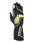 Rękawice kartingowe Alpinestars Tech-1 KX V4, kolory Tar Gray, czarny i żółty fluorescencyjny, widok grzbietu dłoni z oddychającą siatką, duże żółte logo Alpinestars, biały logotyp na nadgarstku, żółta gwiazda na palcu wskazującym, nowoczesny sportowy design