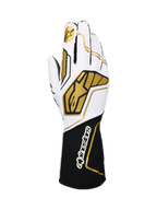 Alpinestars Tech-1 KX V4 Gloves, rękawice kartingowe, biało-czarne ze złotymi akcentami, złote logo gwiazdy na palcu wskazującym i duże złote wzory geometryczne na grzbiecie, oddychająca konstrukcja z siateczki, czarny mankiet z białym logo marki, ergonomiczny design dla sportów motorowych
