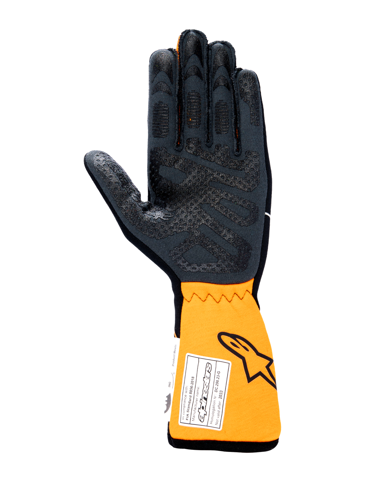 Rękawice Alpinestars Tech-1 Race V4, samochodowe rękawice wyścigowe, widok od strony dłoni w kolorze czarnym i pomarańczowym fluo, z silikonowym wzorem zwiększającym przyczepność na dłoni i palcach, przedłużony pomarańczowy mankiet z etykietą homologacji FIA i logo Astars