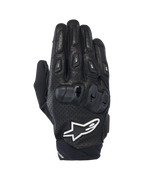 Rękawice Alpinestars SP X 7, krótkie sportowe rękawice motocyklowe, czarno-białe, konstrukcja z perforowanej skóry, ochraniacze kostek TPU o podwójnej gęstości, białe logo gwiazdy Alpinestars, zaprojektowane do sportowej jazdy szosowej