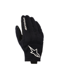 Rękawice Alpinestars Reef V2, czarno-białe rękawice motocyklowe, wierzch dłoni z teksturowanej elastycznej tkaniny z wyraźnym białym logo gwiazdy i napisem na palcu wskazującym, krótki mankiet, miejski design