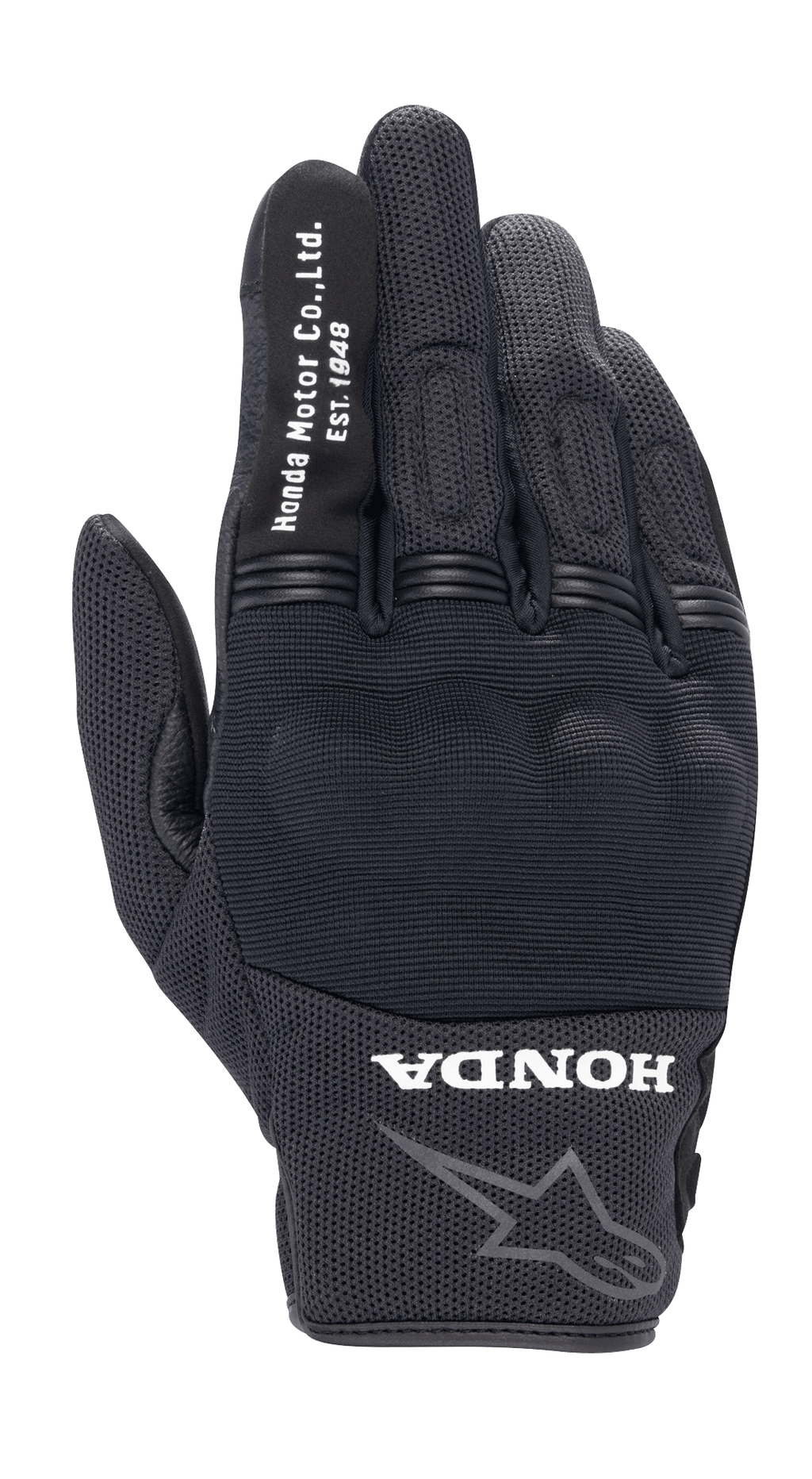 Alpinestars Honda Copper Glove, czarne miejskie rękawice motocyklowe, teksturowana konstrukcja mesh, biały napis „Honda Motor Co. Ltd. Est. 1948” na palcu wskazującym, logo „HONDA” i obrys gwiazdy Alpinestars na nadgarstku, twarda ochrona kostek, lekki sprzęt do jazdy szosowej