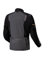 Alpinestars Kurtka ST-7 2L GORE-TEX, motocyklowa kurtka turystyczna adventure, widok z tyłu przedstawiający ciemnoszarą i czarną kolorystykę z elementami odblaskowymi i certyfikatem CE