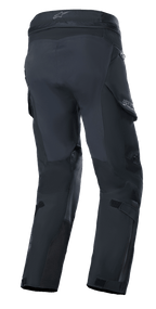 Alpinestars Boulder 3L GORE-TEX Pants, Adventure Motorcycle Pants, Black, rear view showing reinforced seat and inner leg panels, featuring waterproof cargo pockets, GORE-TEX branding on lower leg, and durable laminated construction.