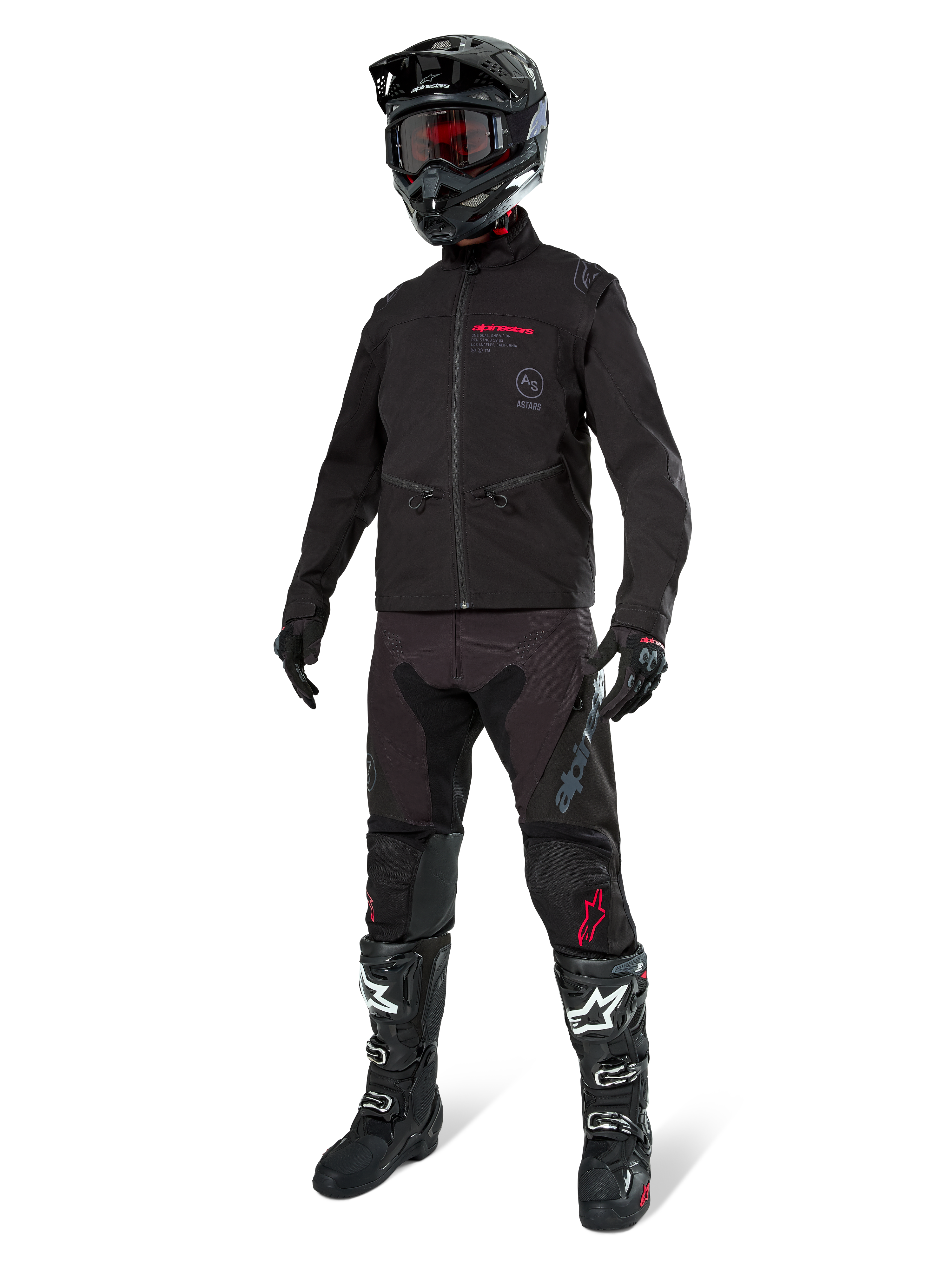Kurtka Alpinestars Lite-Dura Softshell, czarna, zaprezentowana na manekinie w kompletnym zestawie off-road z czarnymi spodniami, czarno-białymi butami i czarnym kaskiem z czerwonymi goglami, profesjonalna odzież motocrossowa i enduro.