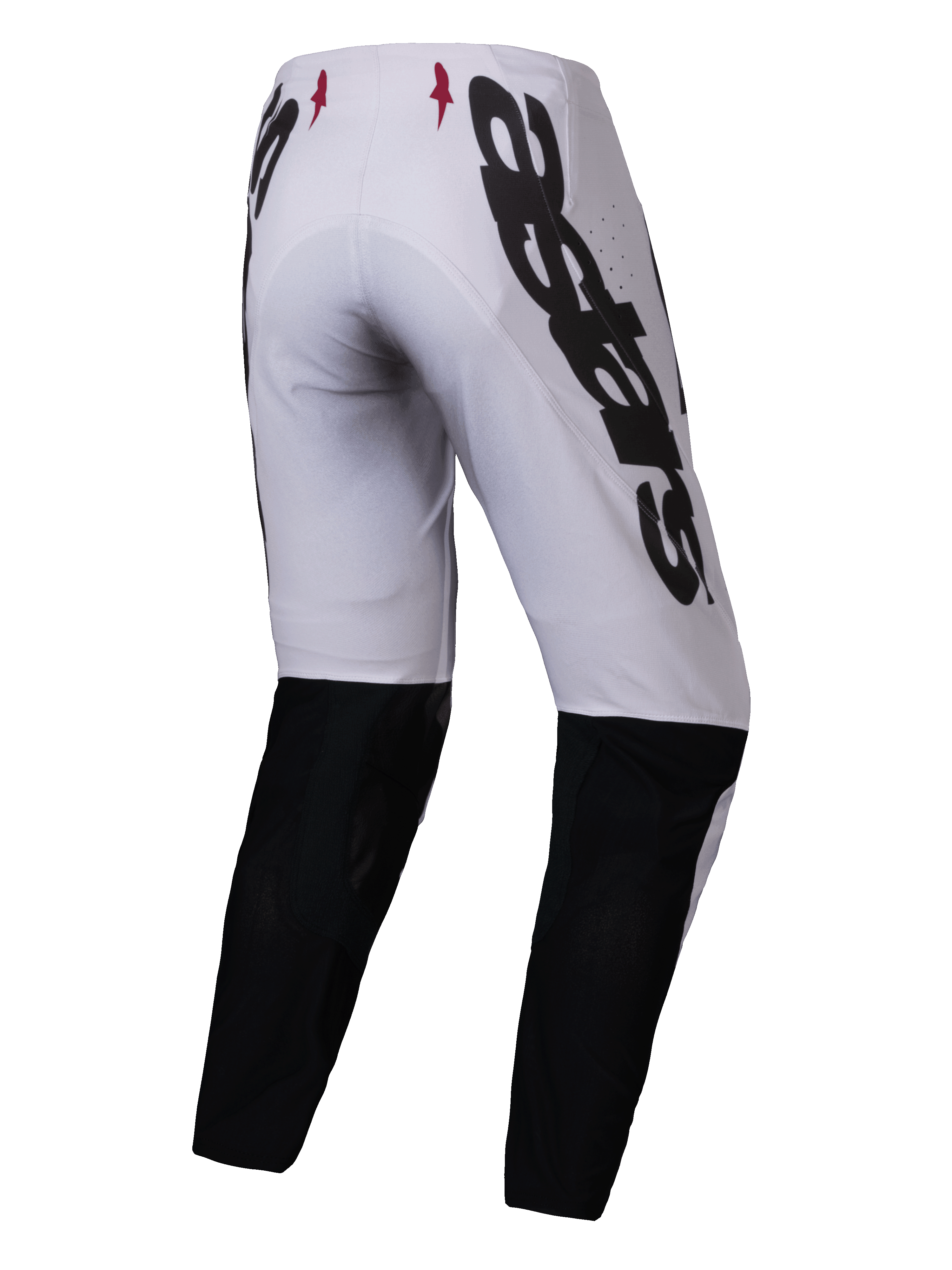 Alpinestars 2025 Supertech Maker Pants, spodnie motocrossowe, srebrne i czarne, widok z tyłu z dużym czarnym logo Alpinestars z boku, czarne panele w dolnej części nogawek i małe czerwone logo gwiazdy na pasku, zaprojektowane dla profesjonalnych osiągów w terenie