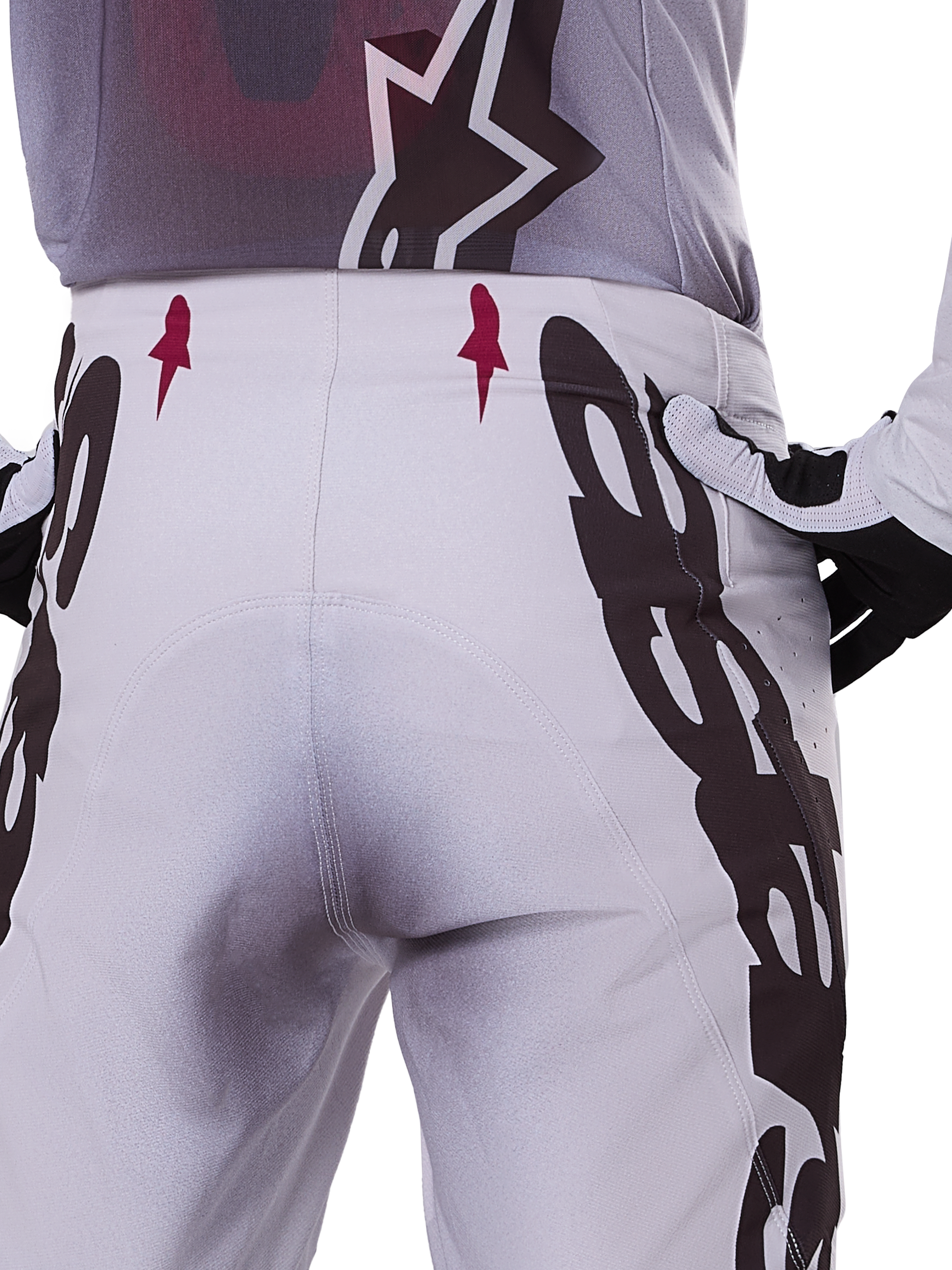 Alpinestars 2025 Supertech Maker Pants, spodnie motocrossowe, srebrne i czarne, sportowy krój z panelami na kolanach ze skóry koziej i strefami Stretchnet, wytrzymała i lekka konstrukcja do profesjonalnego motocrossu