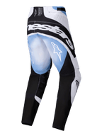 Alpinestars 2025 Techstar Melt Pants, spodnie motocrossowe, czarno-biało-niebieskie z efektem gradientu, widok z tyłu pokazujący duże białe logo na biodrach oraz logo gwiazdy na udach, sportowy design do wyścigów off-road
