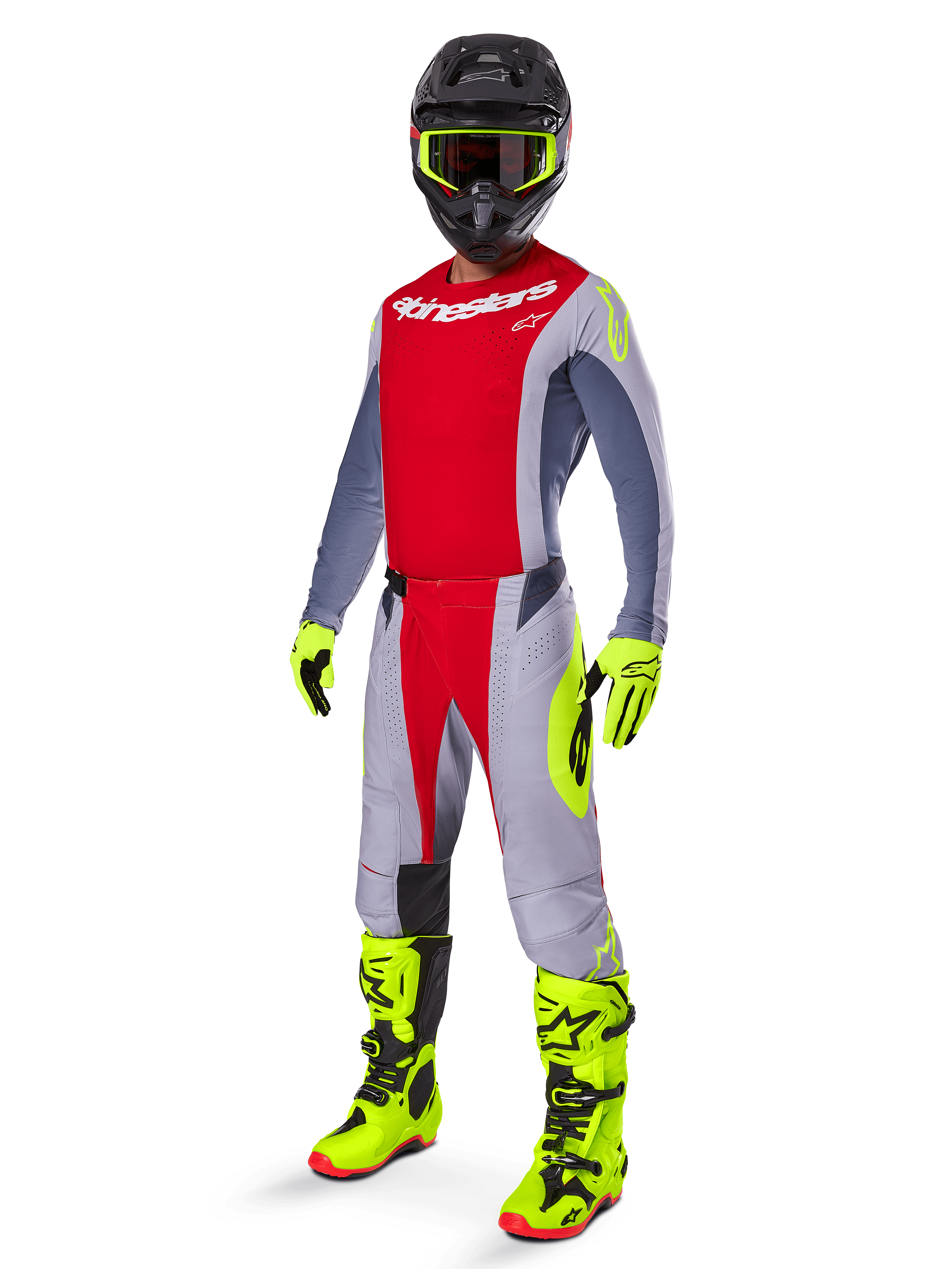 Motocross rider wearing the Alpinestars 2025 Techstar Melt Gear Set, red and gray jersey and pants, vibrant neon yellow gloves and boots, black helmet, complete off-road racing kit