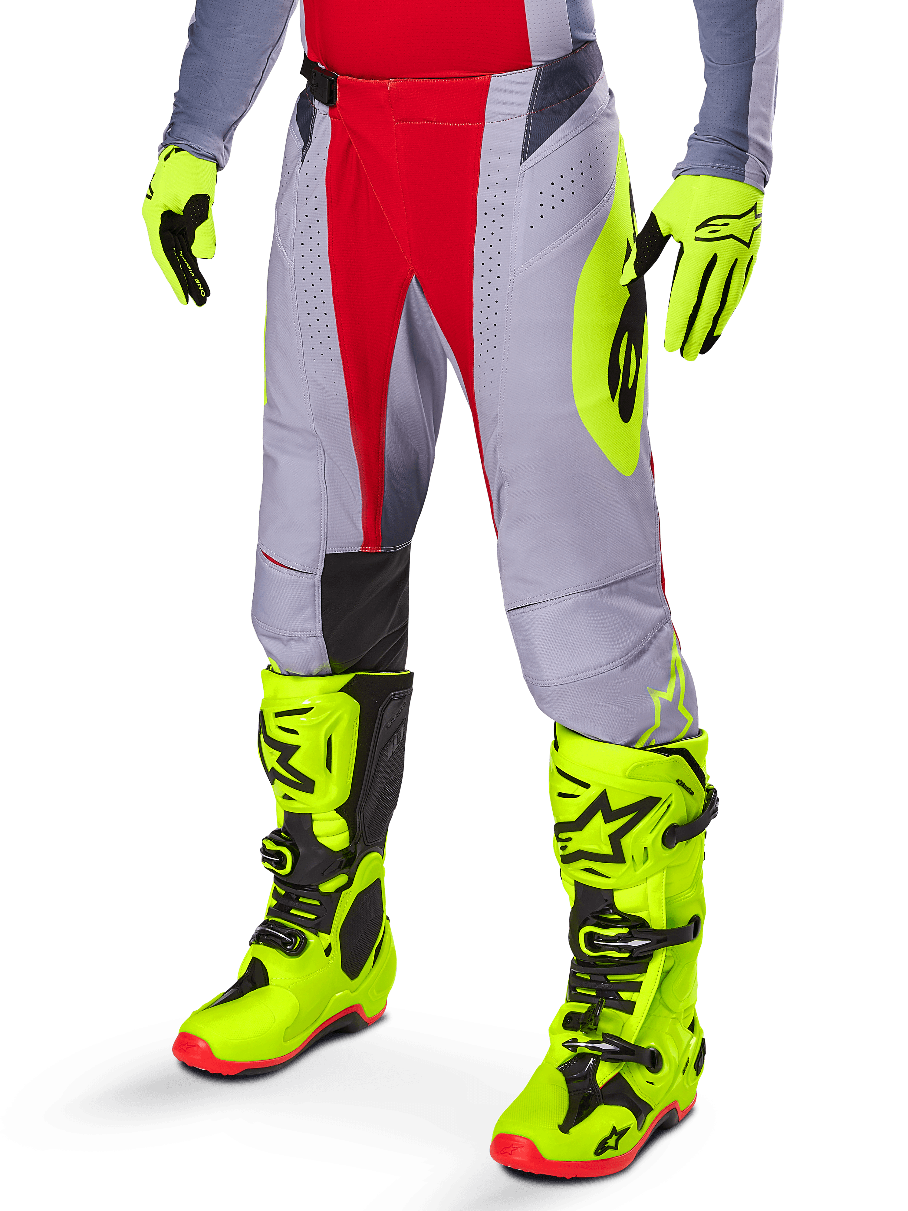 Alpinestars Techstar Melt Pants 2025, spodnie motocrossowe, jasnoczerwone i szare z neonowożółtymi grafikami bocznymi i czarnymi panelami na kolanach, w zestawieniu z pasującymi neonowożółtymi butami i rękawicami, zaprojektowane do wyczynowej jazdy terenowej