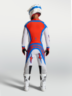 Spodnie Alpinestars Supertech Vesta, spodnie motocrossowe, jasnofioletowe i czerwone, widok z tyłu, sportowy krój wyścigowy.