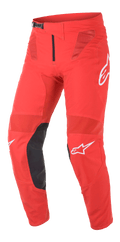 Alpinestars Supertech Blaze Pants, spodnie motocrossowe, jasnoczerwone i czarne, wyposażone w panele wentylacyjne z siatki, czarne skórzane wzmocnienia wewnętrznej części kolan, białe akcenty z logo A-star oraz regulowaną klamrę zapadkową w pasie, do wyczynowej jazdy terenowej