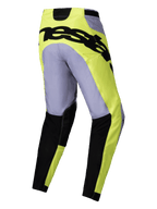 Alpinestars 2025 Racer Veil Pants, spodnie motocrossowe, szare i żółte neonowe, widok z tyłu z wyraźnym czarnym brandingiem na siedzisku, lekka techniczna konstrukcja z czarnymi dolnymi częściami nogawek i profilowanym krojem