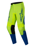 Alpinestars Spodnie Fluid Haul 2025, męskie spodnie motocrossowe, żółte fluorescencyjne i niebieskie, konstrukcja z poliestru 600D ze wstępnie wyprofilowanymi nogawkami i panelami kolanowymi ze skóry syntetycznej