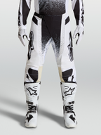 Spodnie Alpinestars Techstar Swan 2027, męskie spodnie motocrossowe, białe i czarne, wytrzymały elastyczny ripstop.