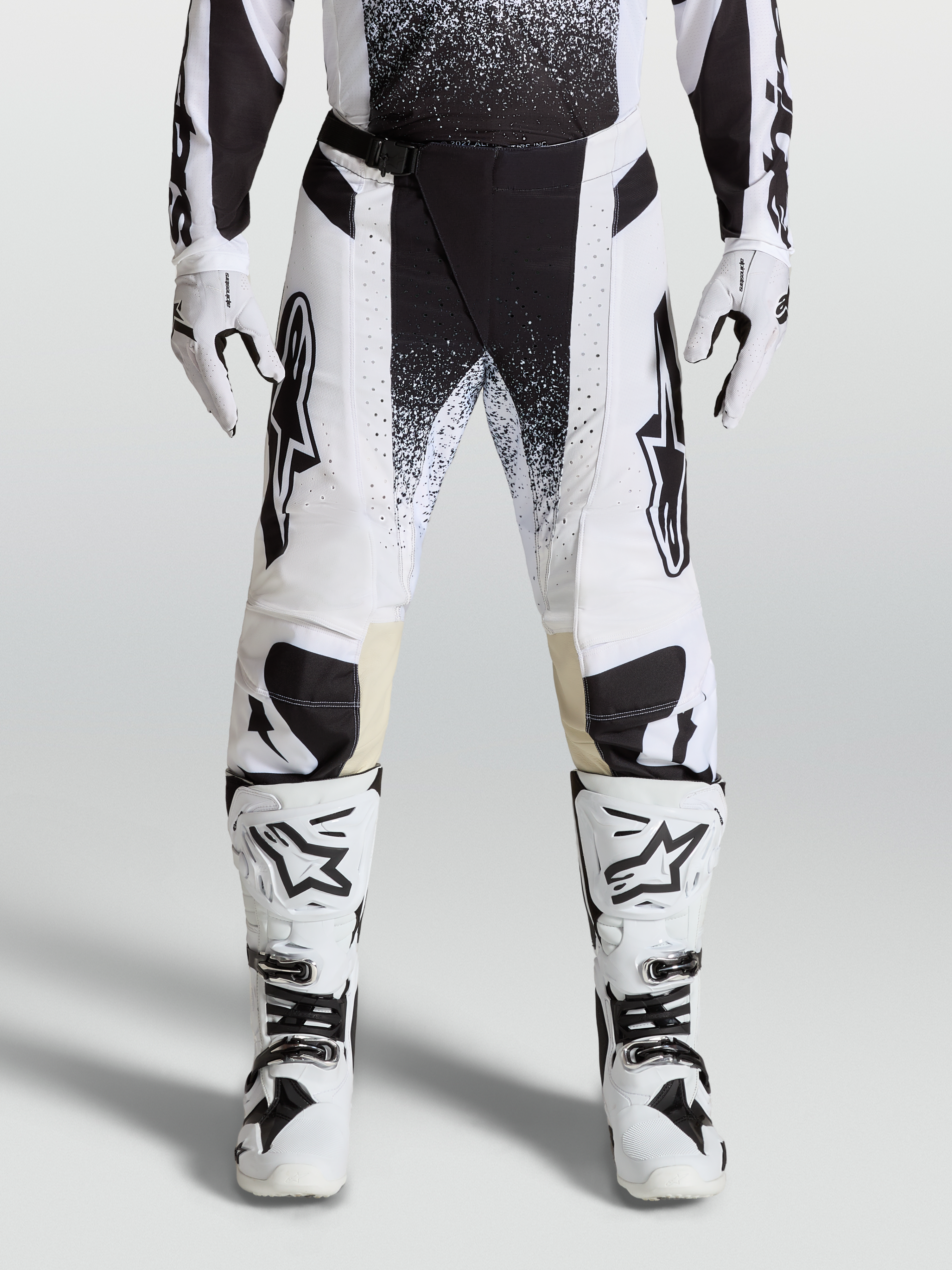 Spodnie Alpinestars Techstar Swan 2027, męskie spodnie motocrossowe, białe i czarne, wytrzymały elastyczny ripstop.