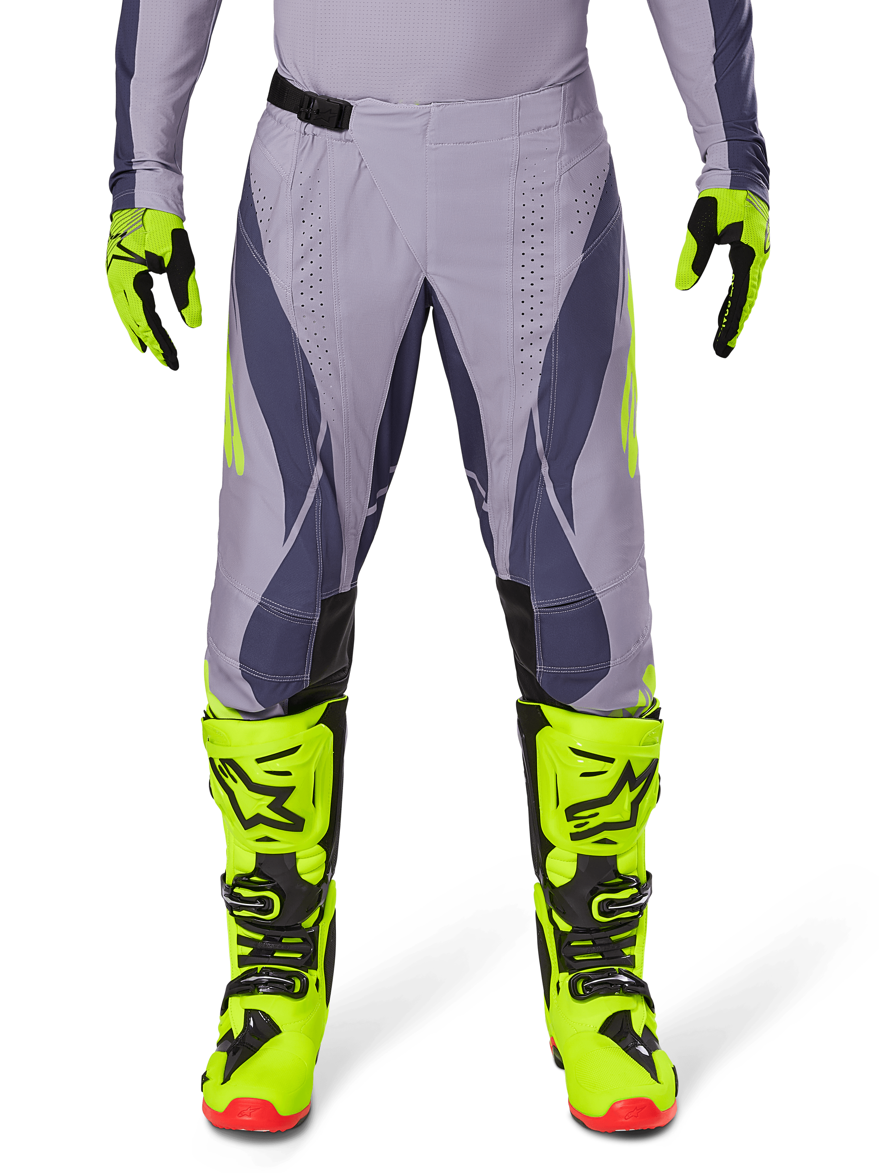 Alpinestars Techstar Dreem Pants 2025, spodnie motocrossowe, jasnoszare i ciemnoszare z neonowymi żółtymi akcentami, zestawione z neonowymi żółtymi butami i rękawicami, laserowo wycinana wentylacja, czarne klamry, czerwone podeszwy butów, profesjonalny sprzęt motocrossowy