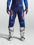 Spodnie Alpinestars Racer Hunt, niebieskie i czerwone męskie spodnie motocrossowe, wyprofilowana konstrukcja z grafiką gwiazdy.