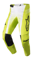 Spodnie Alpinestars 2023 Techstar Push, spodnie motocrossowe, żółte fluo i białe z czarnymi akcentami, skórzane wzmocnienia kolan, perforowane panele wentylacyjne, duże czarne logo na udzie, regulowana klamra w pasie, wysokiej klasy odzież off-road