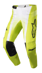 Spodnie Alpinestars 2023 Techstar Push, spodnie motocrossowe, żółte fluo i białe z czarnymi akcentami, skórzane wzmocnienia kolan, perforowane panele wentylacyjne, duże czarne logo na udzie, regulowana klamra w pasie, wysokiej klasy odzież off-road