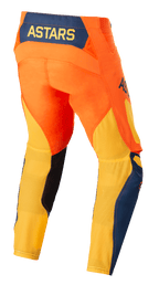 Alpinestars Techstar Factory Pants, Motocross Pants, Orange, Dark Blue, and Warm Yellow, rear view featuring the yellow ASTARS logo on a dark blue back panel, vibrant orange chassis with breathable yellow mesh on the lower legs and blue accents