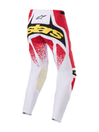 Alpinestars Techstar Nomur Pants 2026, spodnie motocrossowe, biało-czerwono-czarne, widok z tyłu z żółtym brandingiem „Stars” i czerwoną nakrapianą grafiką, trwała wielopanelowa konstrukcja do jazdy off-road